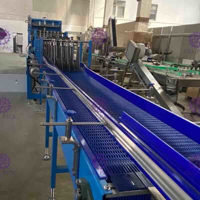 Linear Shrink Wrapper Sepenuhnya Otomatis Untuk Peralatan Pengemasan Botol Plastik Dengan Film Cetak